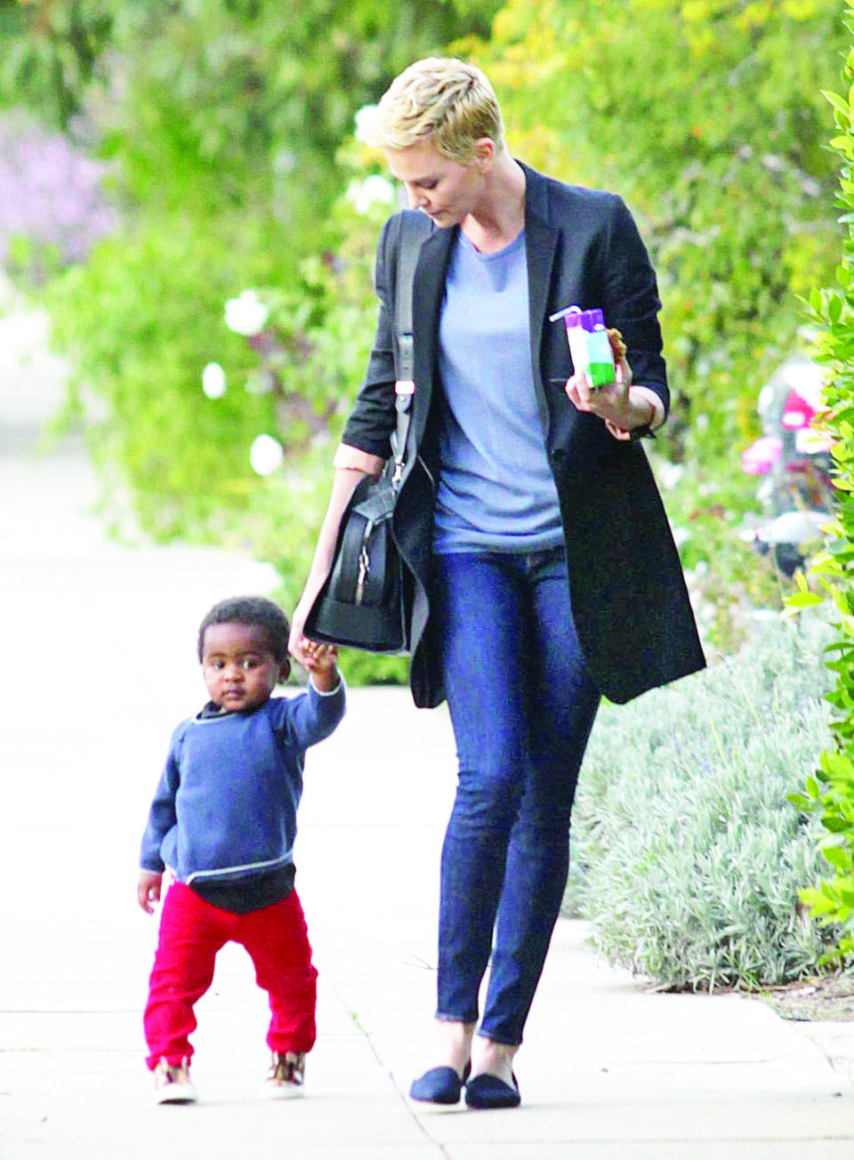 Semi-Exclusive... 51020727 'Prometheus' actress Charlize Theron takes her son Jackson to a play date in Hollywood, California on February 22, 2013. FameFlynet, Inc - Beverly Hills, CA, USA - +1 (818) 307-4813