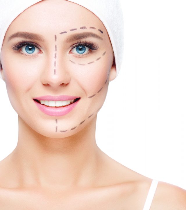 Woman with perforation lines on her face