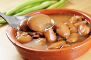 29651990 - a traditional earthenware bowl with broad bean stew